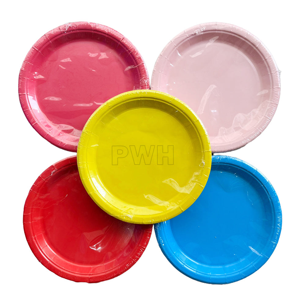 Premium 7 inch solid color disposable food-grade paper party plates available in assorted vibrant colors for serving cakes, desserts, snacks, and celebration table settings by PartyWholesale India