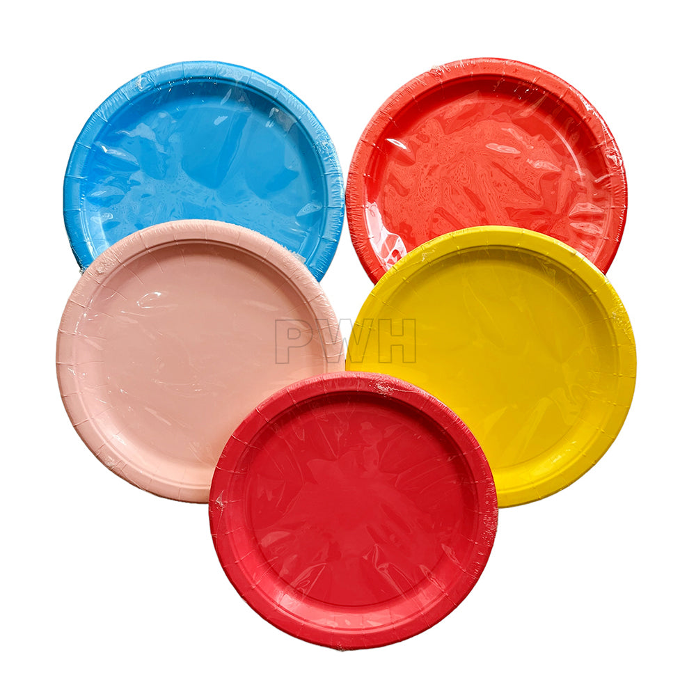 Premium 9 inch solid color food-grade paper party plates available in assorted vibrant colors for birthdays, weddings, baby showers, catering events, and celebration table settings by PartyWholesale India