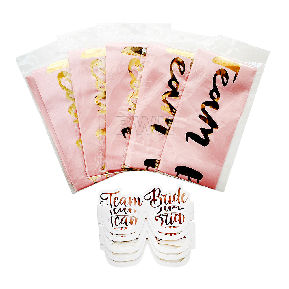 Rose Gold Team Bride satin sashes with matching paper party goggles set for bachelorette parties, bridal showers, hen nights, and bridal squad celebrations from Party Wholesale Hub India.